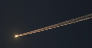 Photo of meteor streaking across dark sky