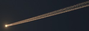Photo of meteor streaking across dark sky